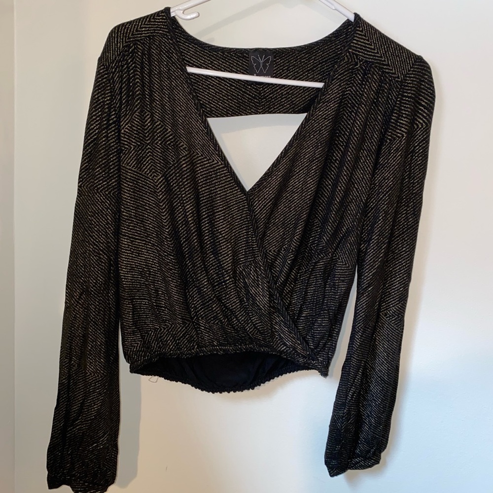 Black and gold going out top